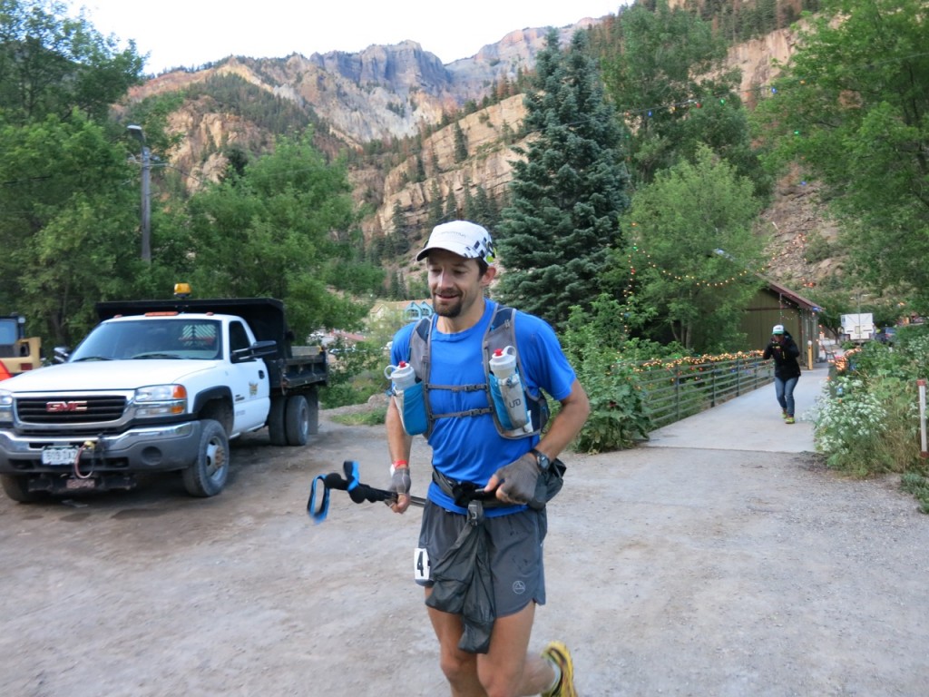 Jared runs in to Ouray aid station looking strong and confident. He is happy to see his family waiting for him and spends a moment wit them before continuing on his way.