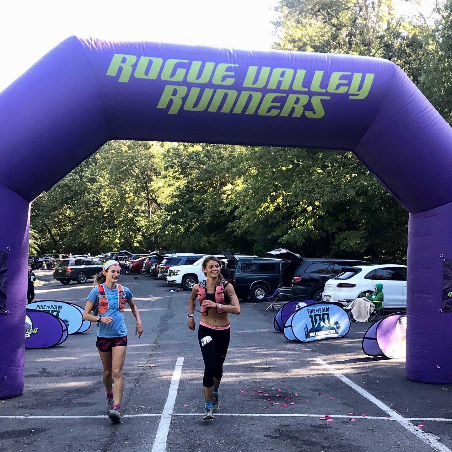 Camelia and Jessie cross the finish line together