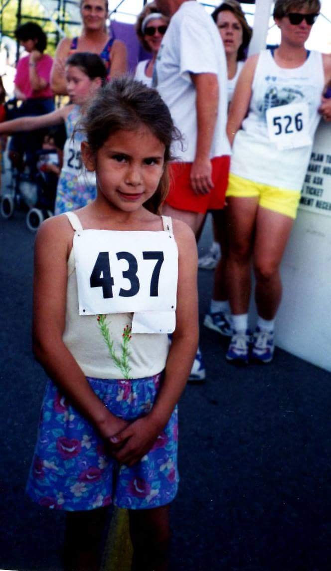 Ashleigh lines up for a race as a young girl