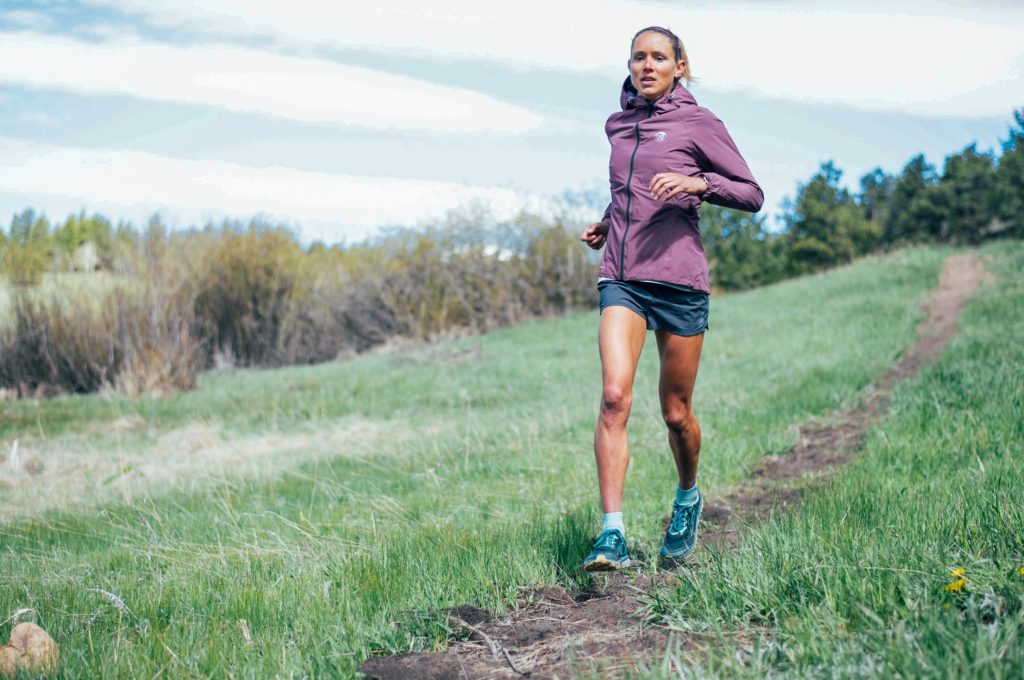 Amelia Boone running in the Ultimate Direction Deluge Jacket